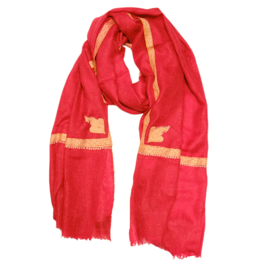 Red scarf with gold accents on a white background